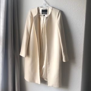 Cream J. Crew pea coat.